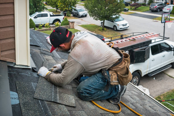 Professional Roofing technician working in Lewisville, IN